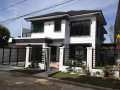 cmbuildersmodern-zen-2-storey-residence-Los-Banos05